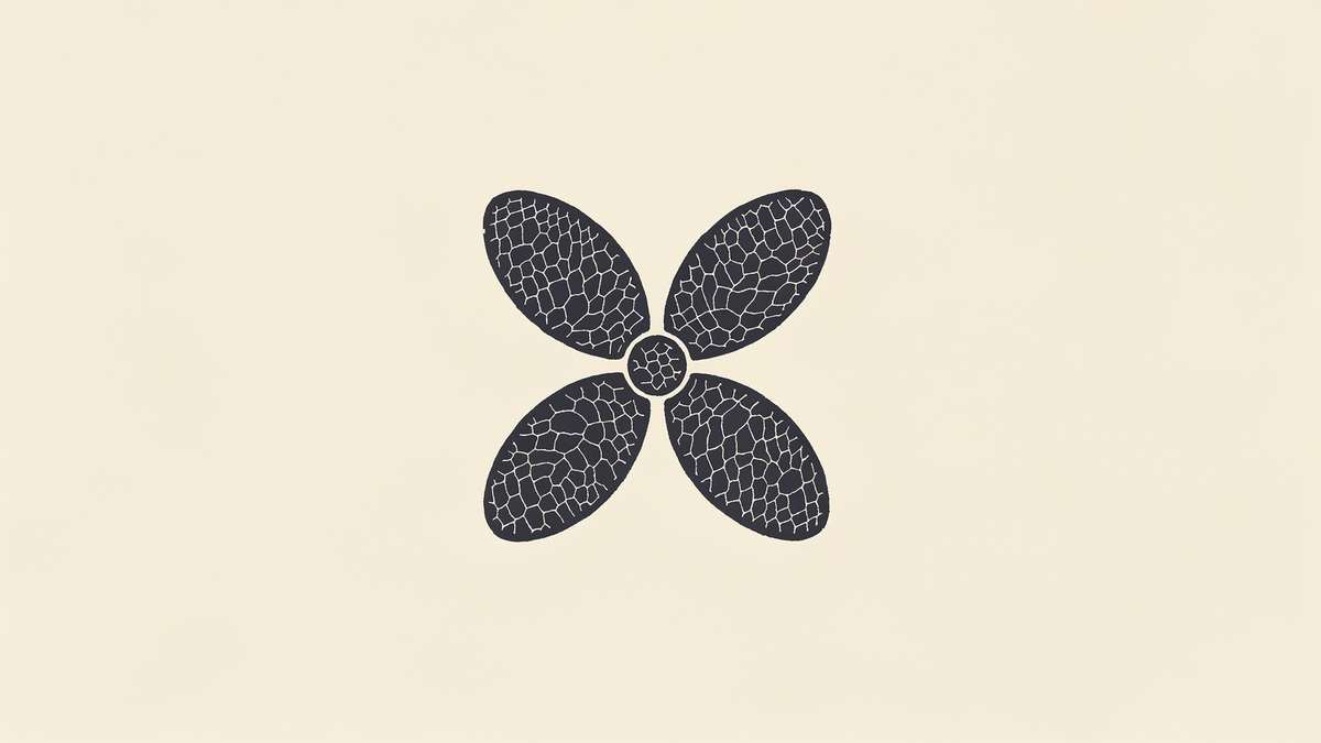 A single Kawung batik motif in indigo — four symmetrical petals around a small center circle — on a quiet ivory ground with fine wax-crackle veining