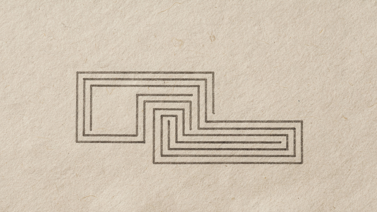 A single continuous line forming a greek key meander border, turning at right angles in an even, unbroken rhythm